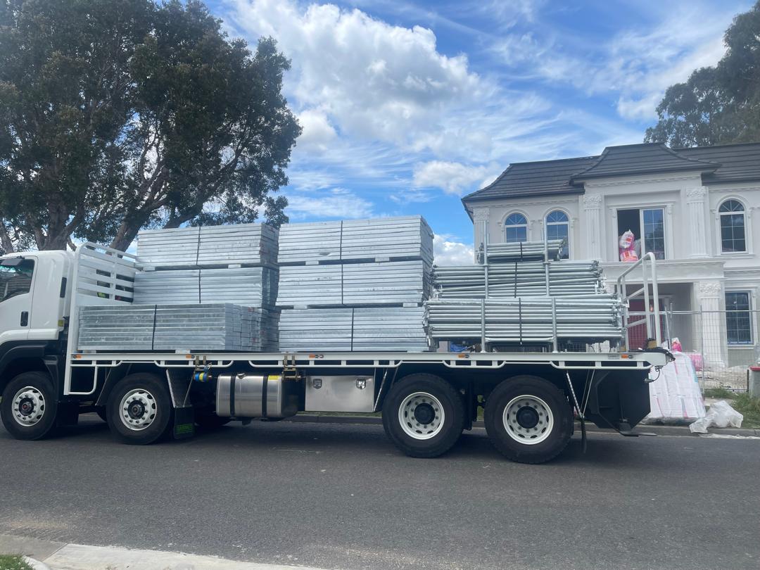 Scaffolding stacks delivered to a residential construction site in Melbourne